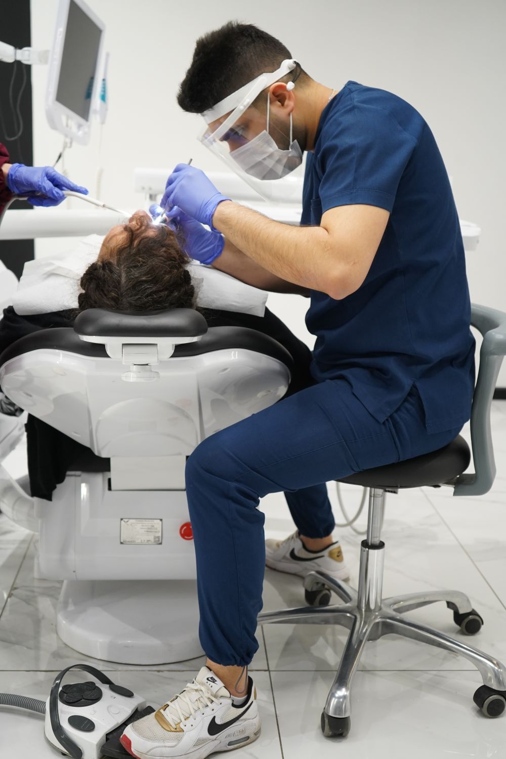 A dentist carrying out a routine check-up